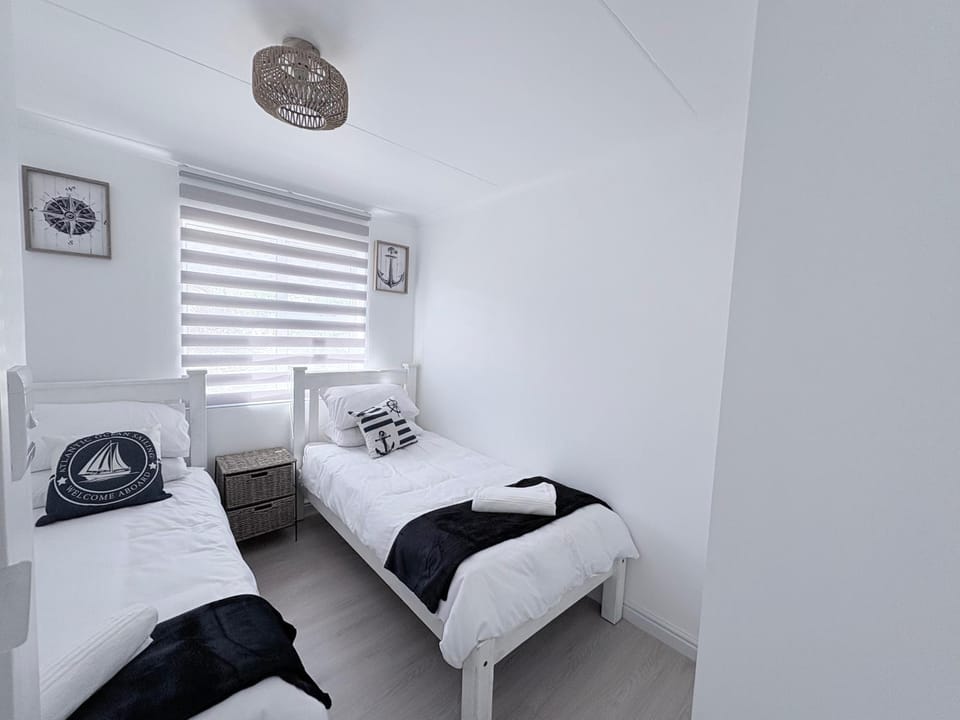 Ocean Breeze 138 Big Bay Beach Club Apartment in Cape Town