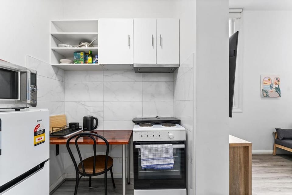 Kitchen or kitchenette, oven, stove
