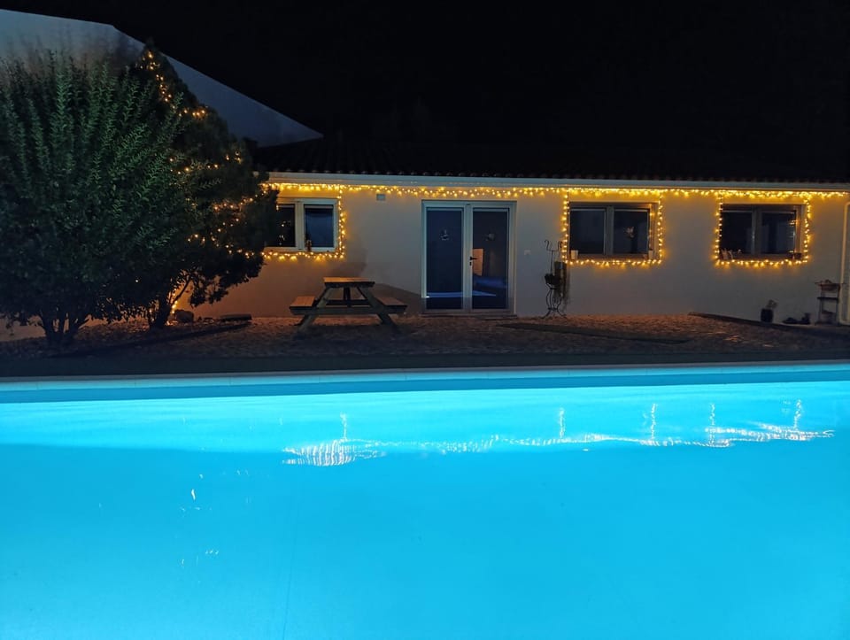 Property building, Night, Pool view, Swimming pool