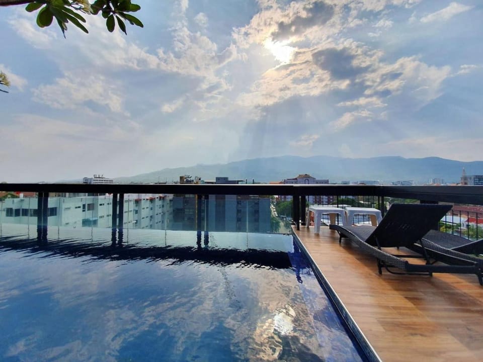 Swimming pool, sunbed