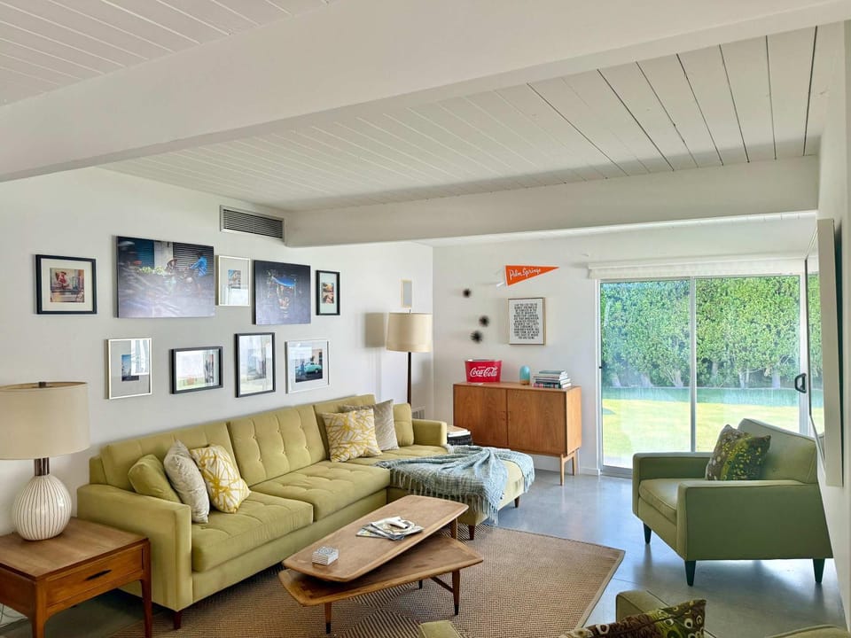 Navigate Stays Yellow Umbrella Poolside Escape House in Palm Springs