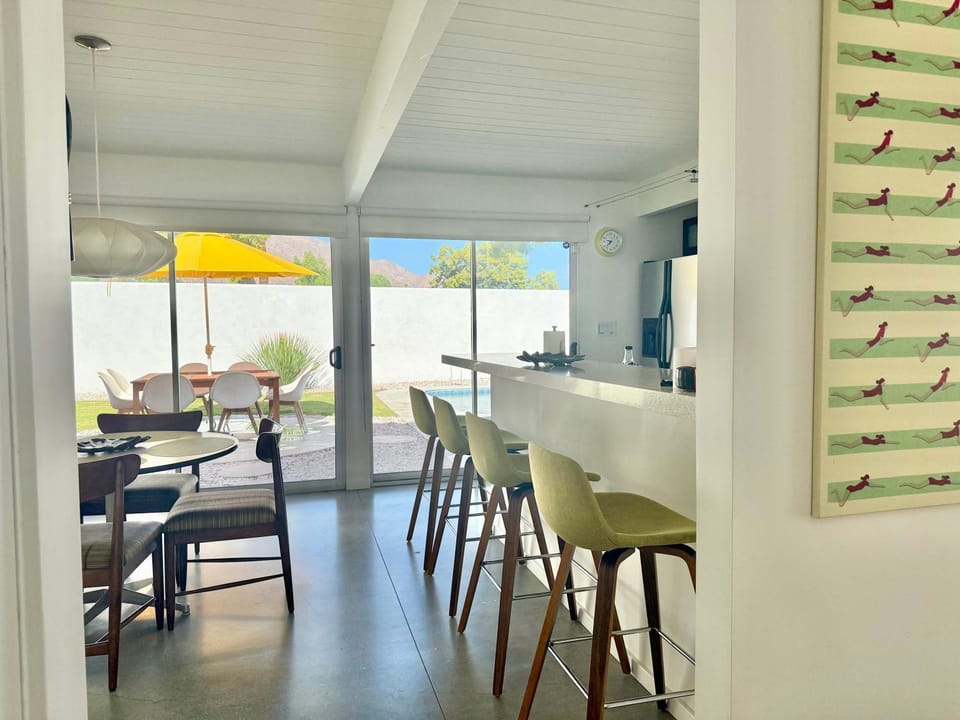 Navigate Stays Yellow Umbrella Poolside Escape House in Palm Springs