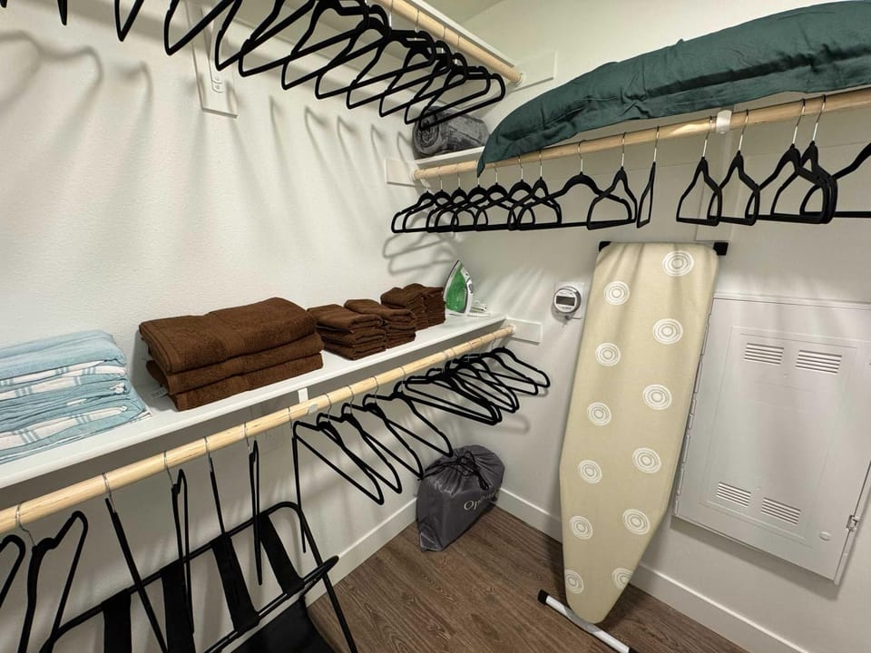 flat iron, towels, wardrobe