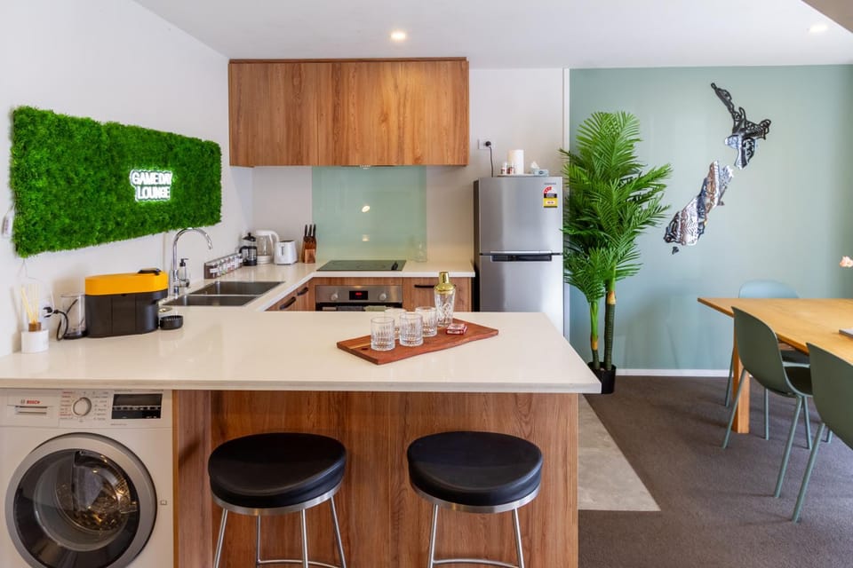 Kitchen or kitchenette, Dining area, oven, stove, washing machine, dryer