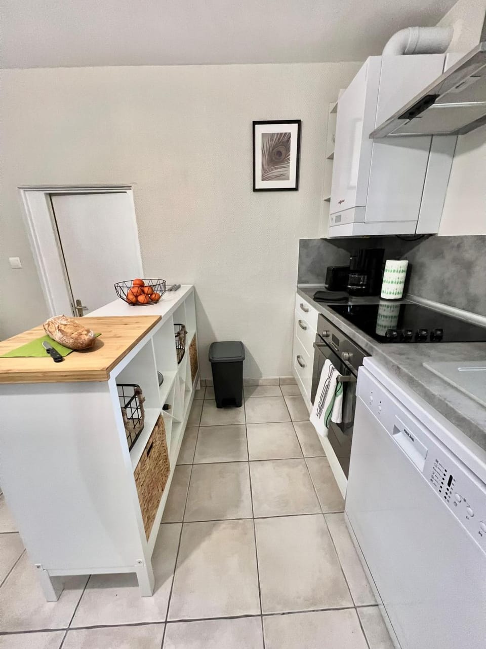 Kitchen or kitchenette, dishwasher, oven, stove, toaster