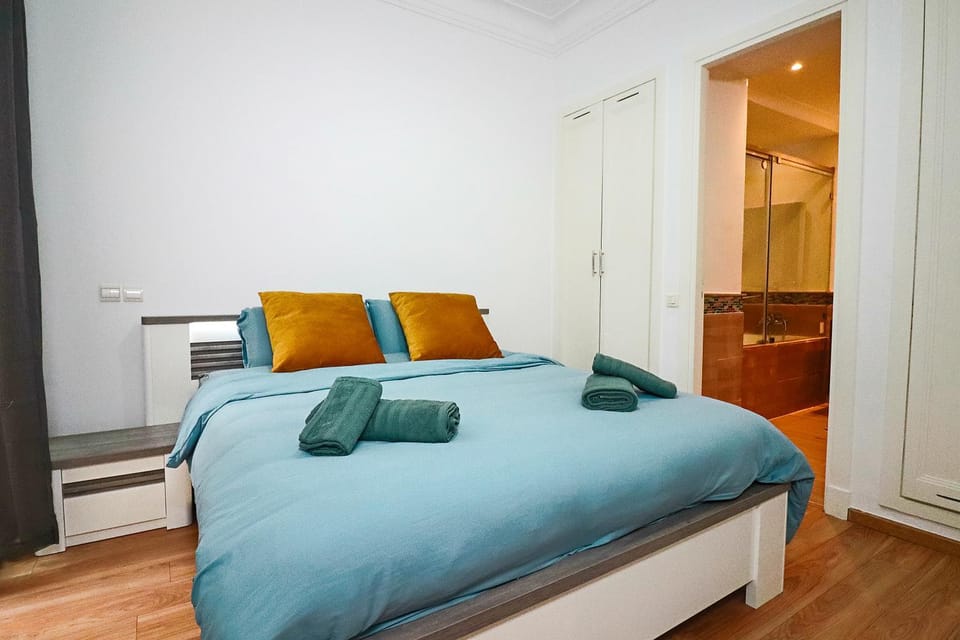 Bed, Photo of the whole room, Bedroom, towels, wardrobe