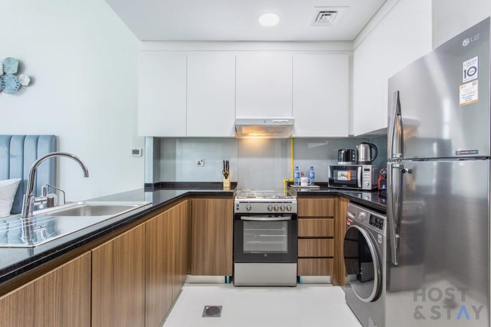 Kitchen or kitchenette, dishwasher, oven, pet friendly, stove, toaster, washing machine, dryer