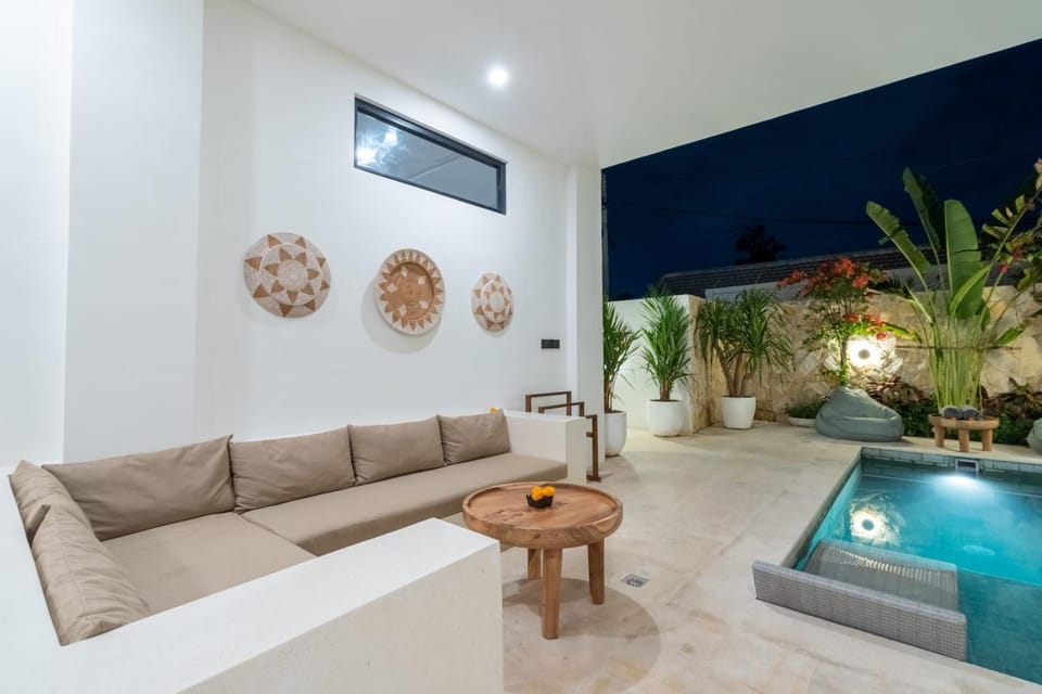 Living room, Seating area, Pool view