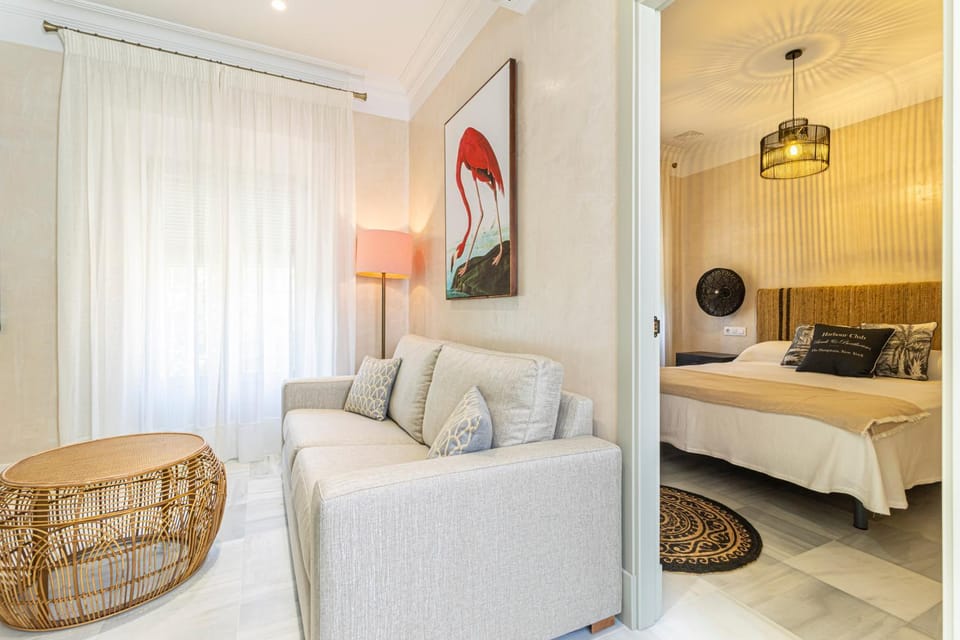 Bed, Living room, Seating area, Bedroom