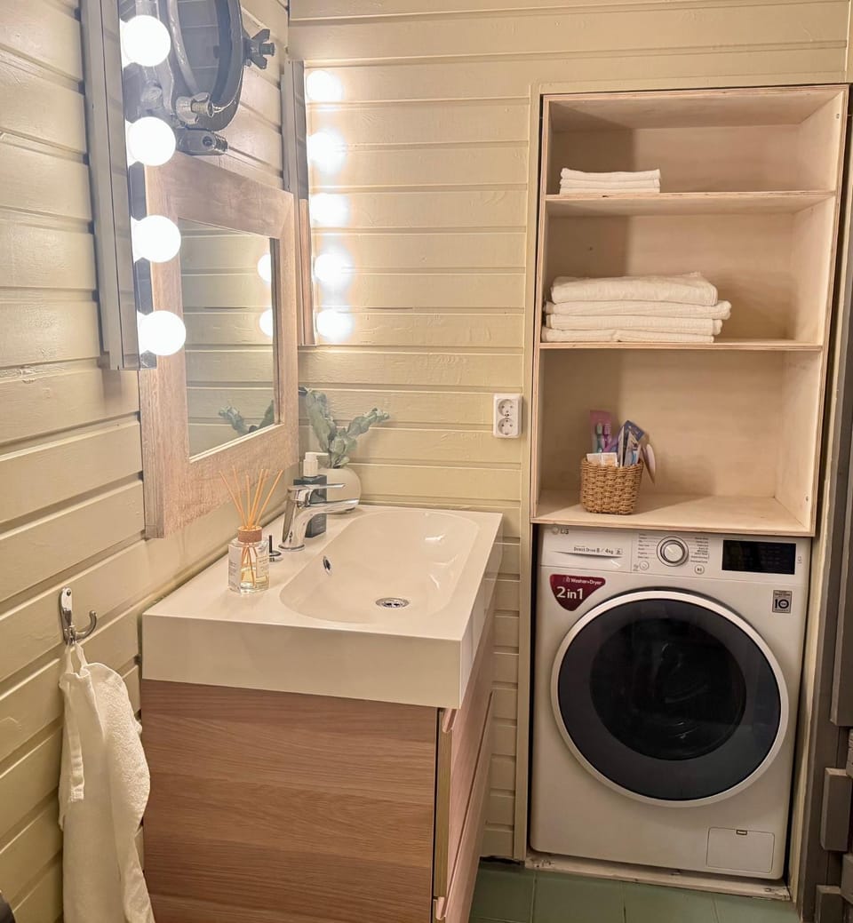 Shower, Toilet, Bathroom, towels, washing machine, dryer