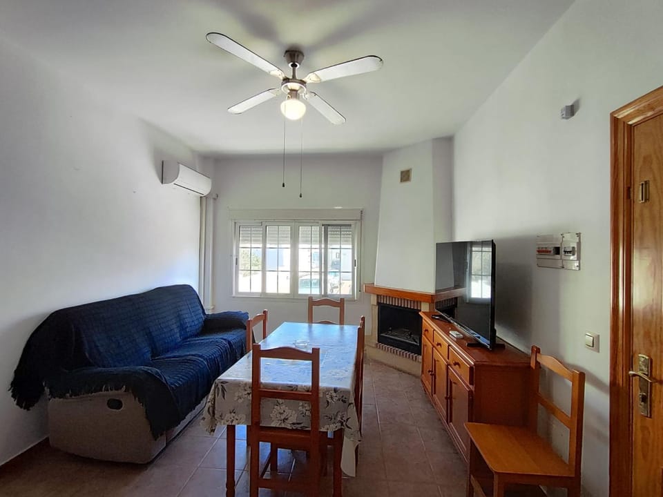 Communal lounge/ TV room, Living room, Seating area, Street view, Street view, fireplace, heating, air conditioner