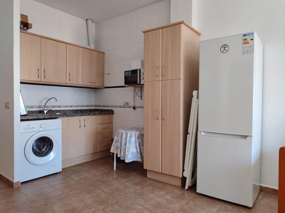 Kitchen or kitchenette, Photo of the whole room, Street view, Street view, microwave, stove, wardrobe, washing machine