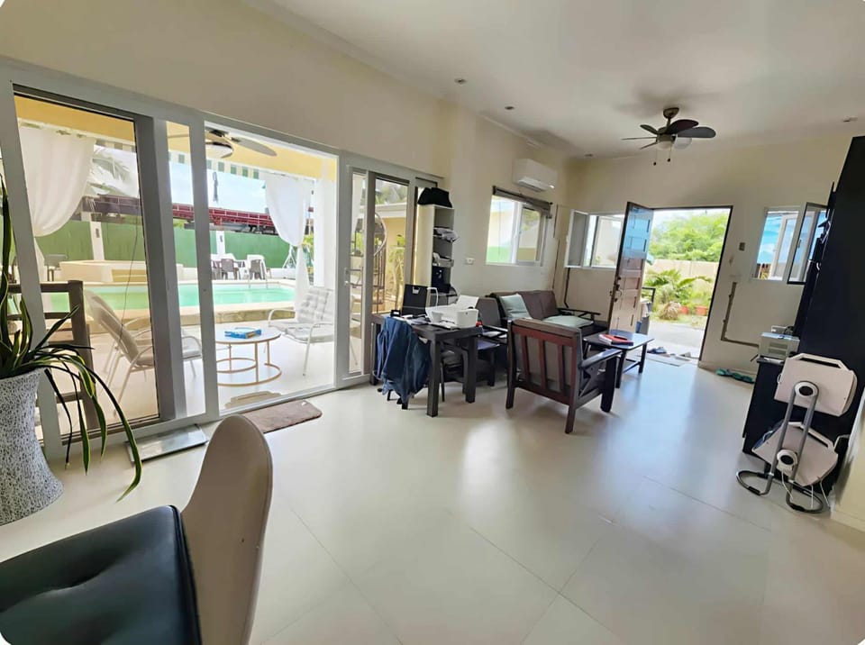 Property building, Living room, Swimming pool