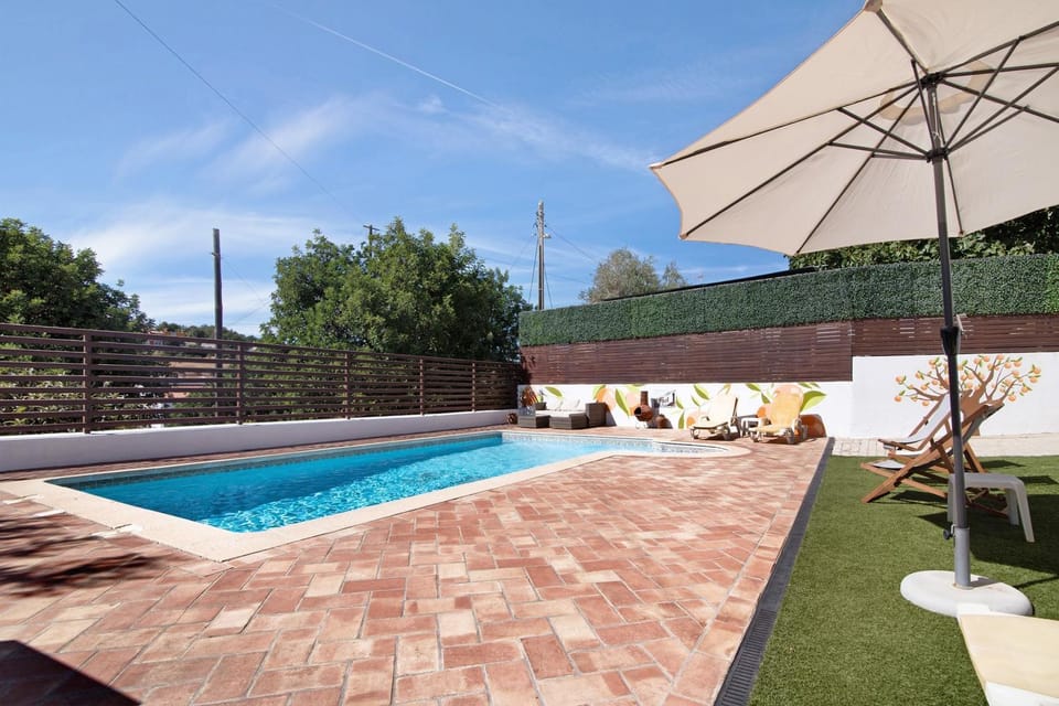 Property building, Living room, Swimming pool