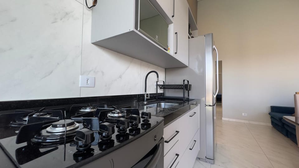 Kitchen or kitchenette, stove