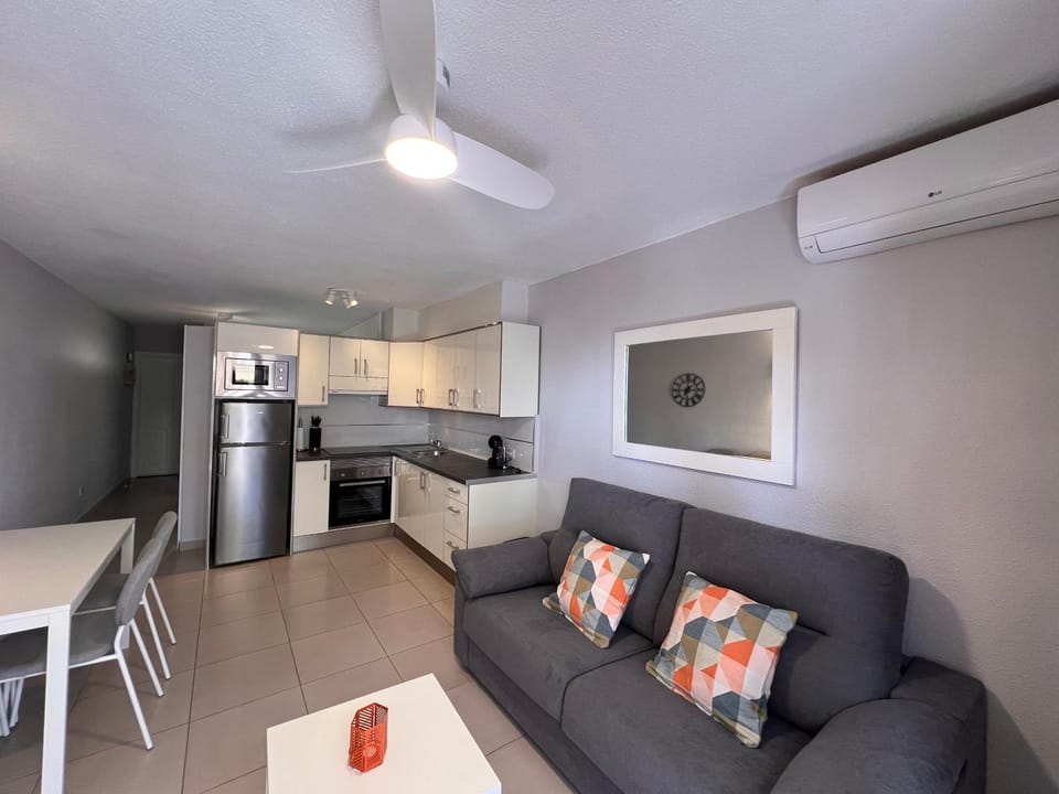 Kitchen or kitchenette, Living room, Seating area, Dining area, oven, toaster, air conditioner
