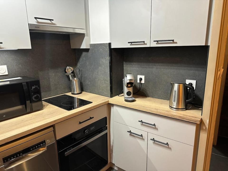 Kitchen or kitchenette, stove