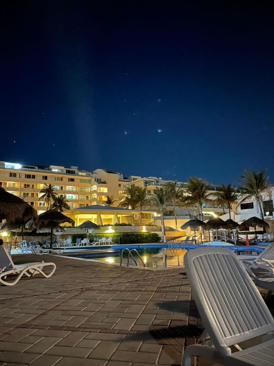 Property building, Night, Natural landscape, Pool view, Swimming pool, sunbed