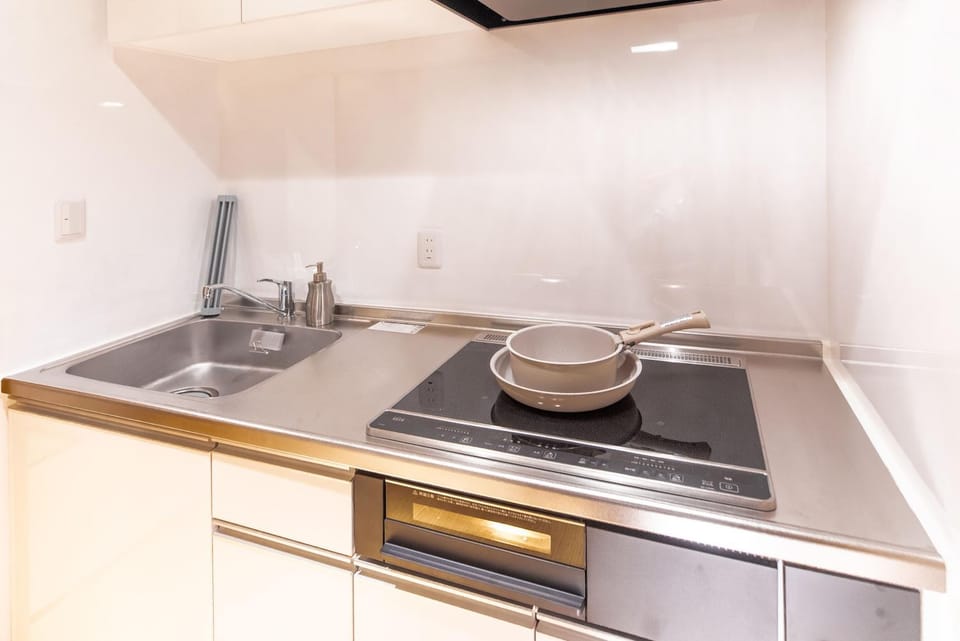 Kitchen or kitchenette, stove