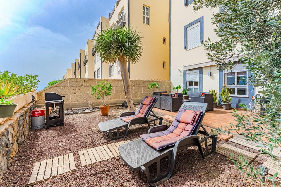 Property building, Patio, Day, Garden, View (from property/room), Balcony/Terrace, Garden view, sunbed