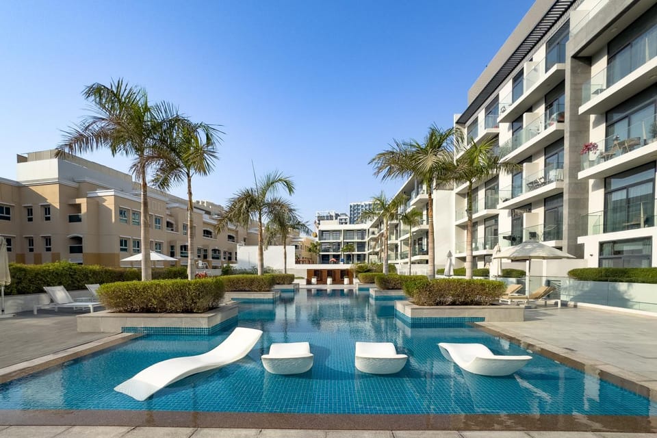 Property building, Patio, Pool view, Swimming pool, sunbed