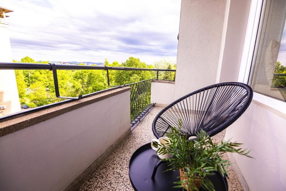 View (from property/room), Balcony/Terrace, Seating area, Garden view