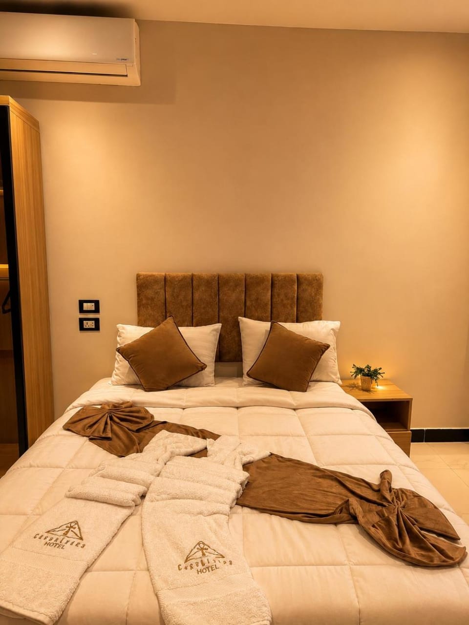 Bed, Photo of the whole room, Bedroom, towels, air conditioner