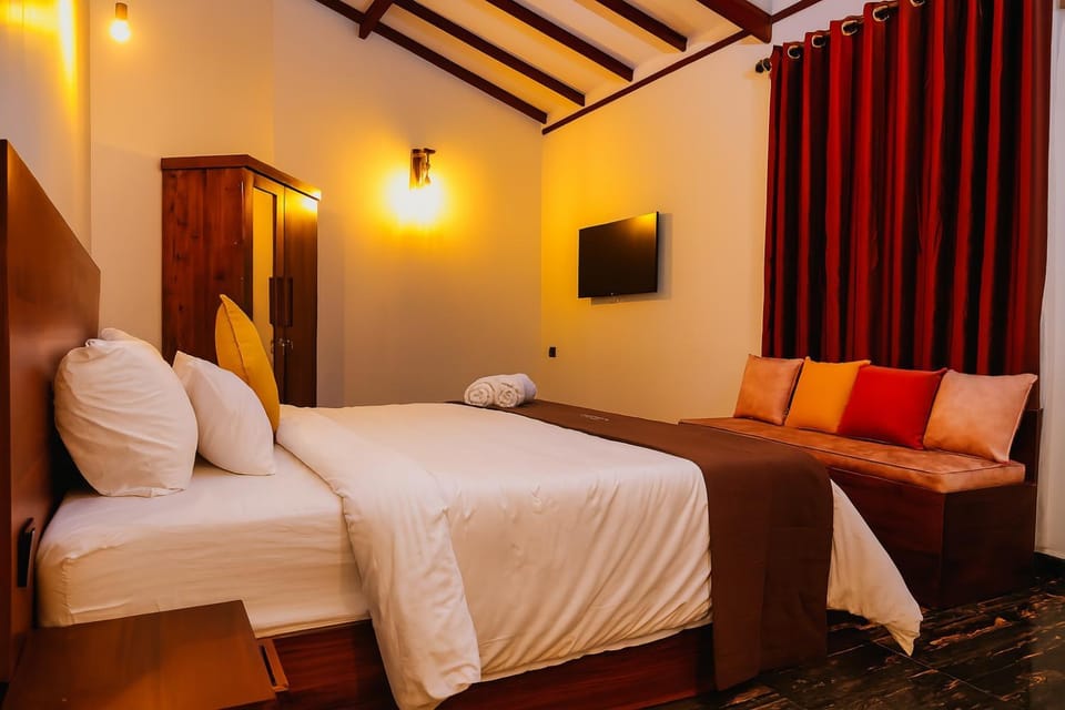 Bed, TV and multimedia, Living room, Seating area, Bedroom, wardrobe