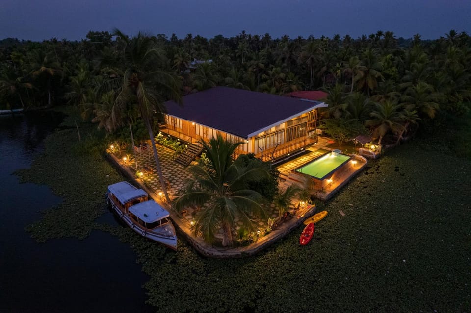 Property building, Night, Natural landscape, Pool view, River view, Swimming pool