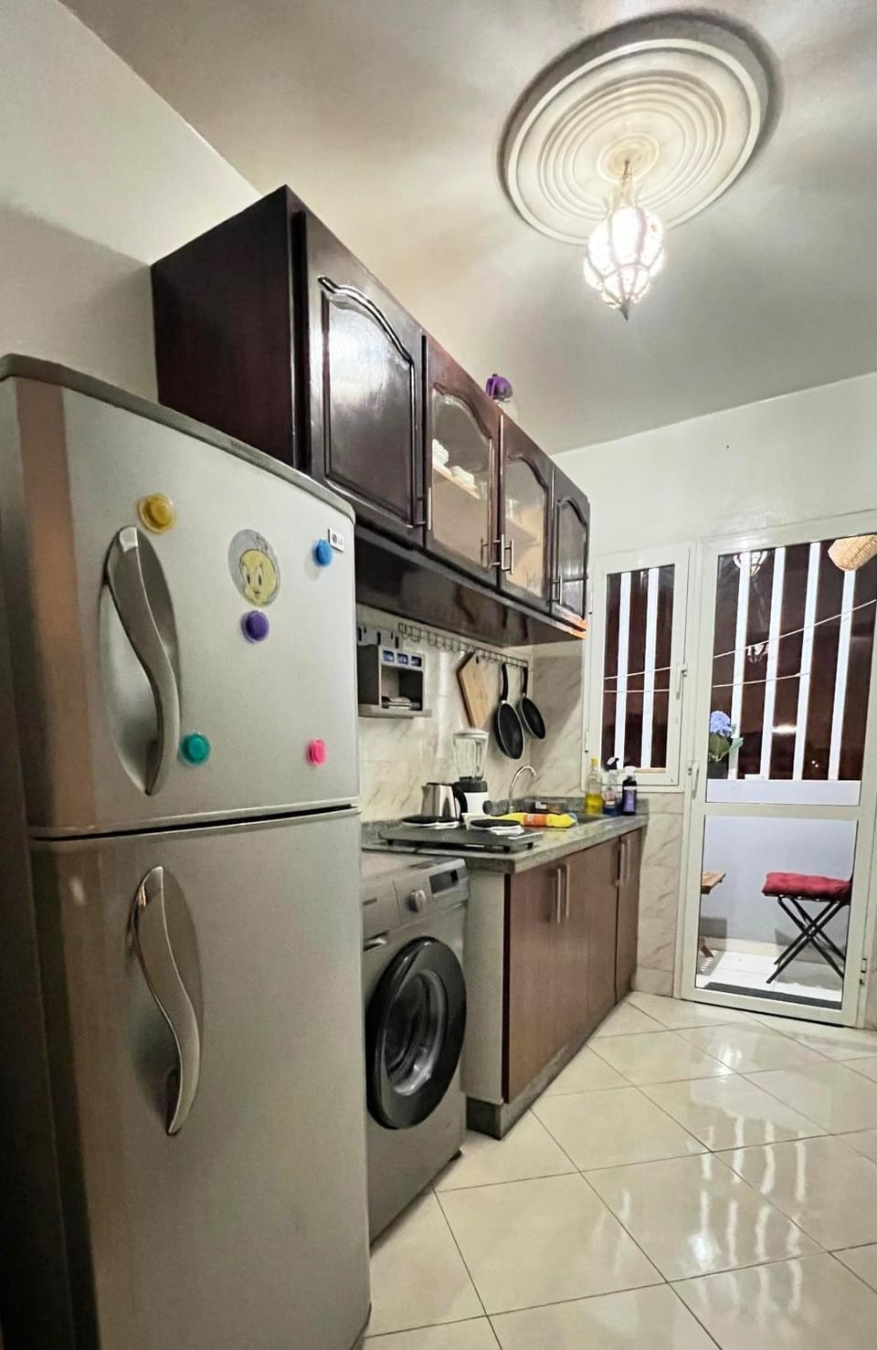 Balcony/Terrace, Kitchen or kitchenette, stove, washing machine, dryer, kitchen