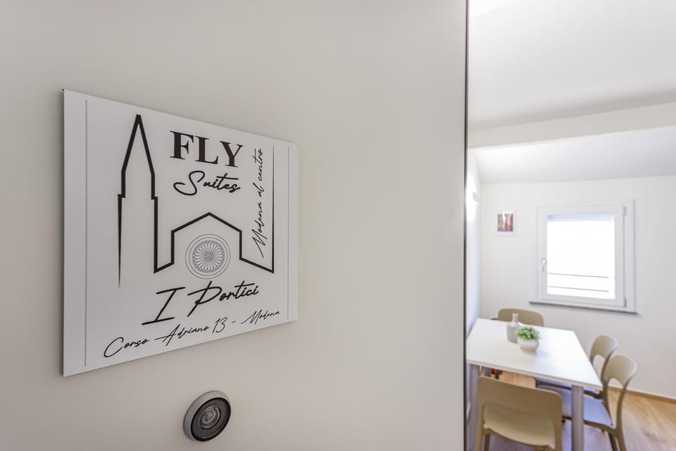 Property logo or sign, Living room, Decorative detail, Seating area