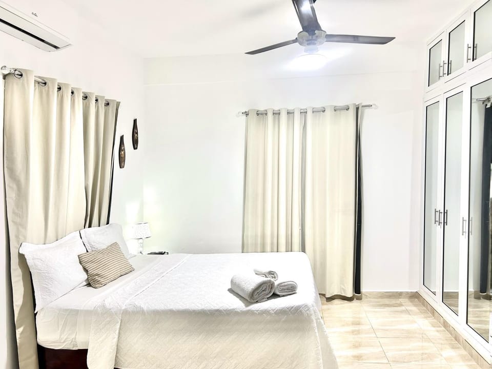 Bed, Photo of the whole room, Bedroom, towels, air conditioner