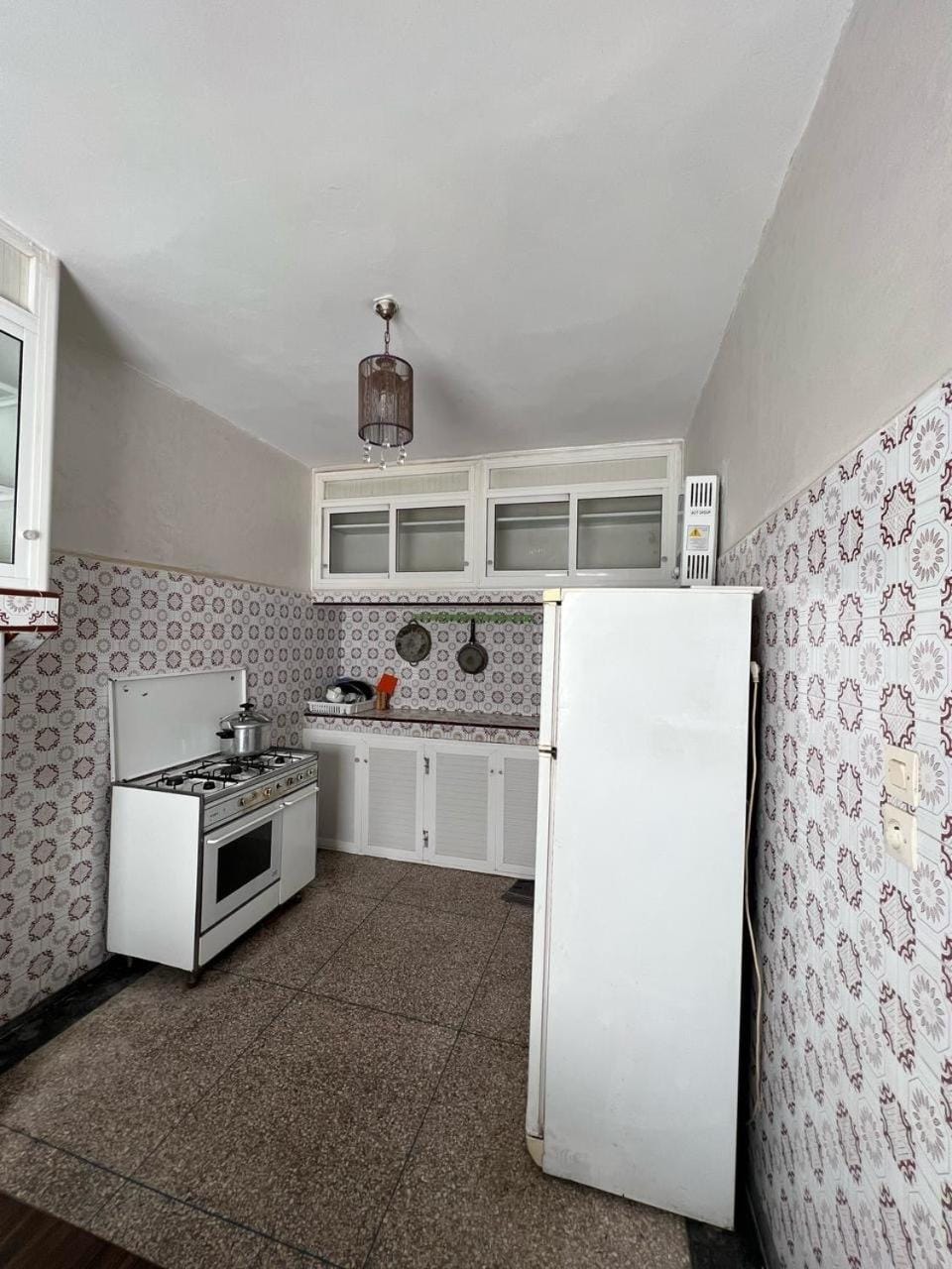 Kitchen or kitchenette, oven, toaster