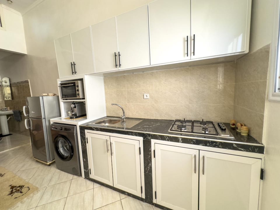 Kitchen or kitchenette, oven, stove