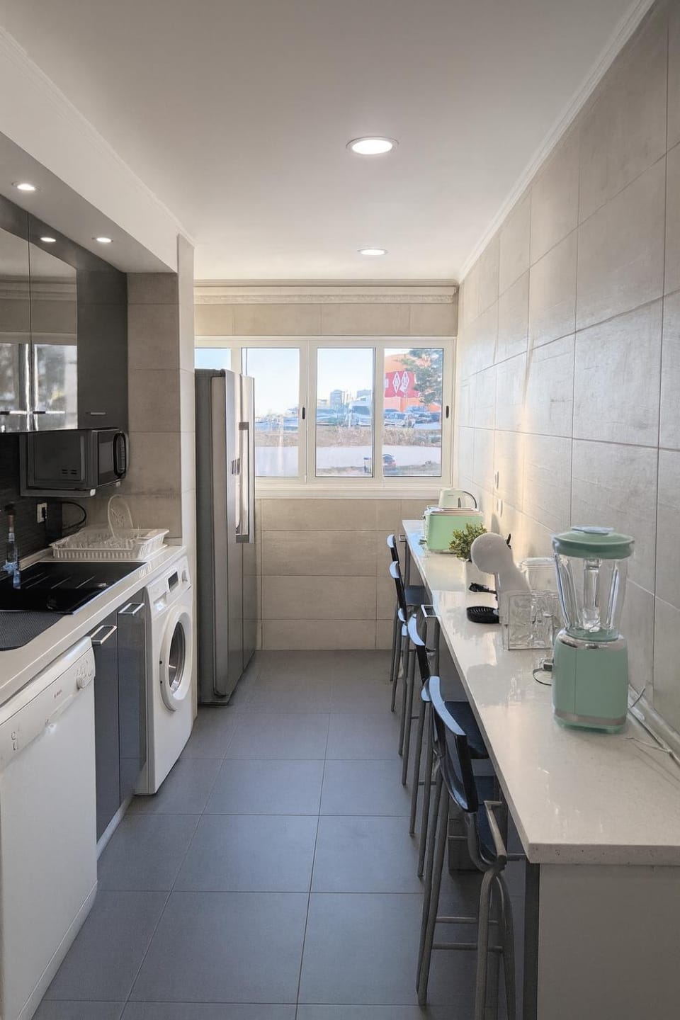 Kitchen or kitchenette, Dining area, dishwasher, microwave, oven, stove, toaster, washing machine, dryer