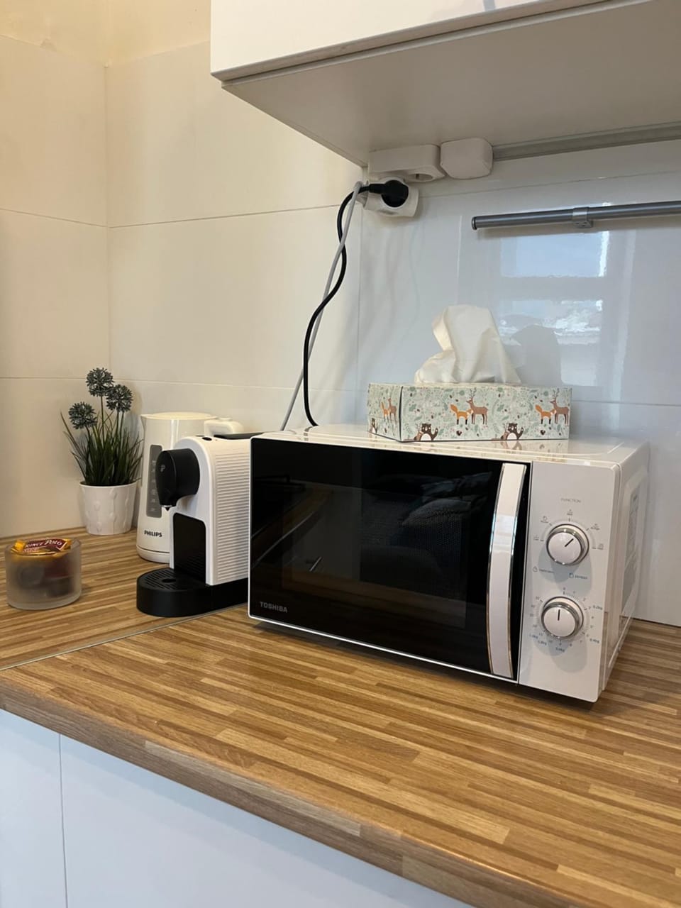 Kitchen or kitchenette, microwave