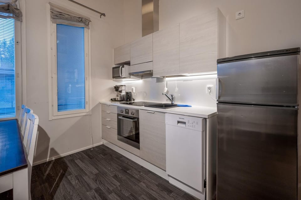 Kitchen or kitchenette, dishwasher, oven, stove