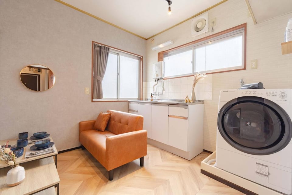 Kitchen or kitchenette, Living room, Seating area, washing machine, dryer