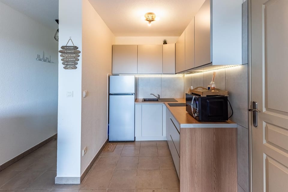 Kitchen or kitchenette, stove