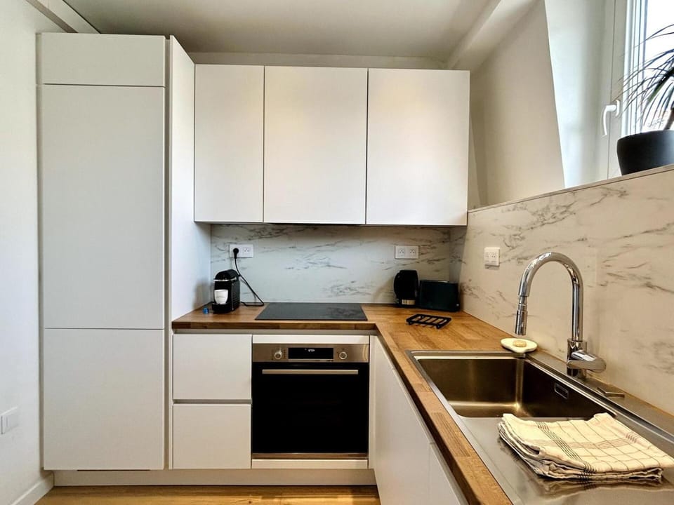 Kitchen or kitchenette, oven, stove, toaster