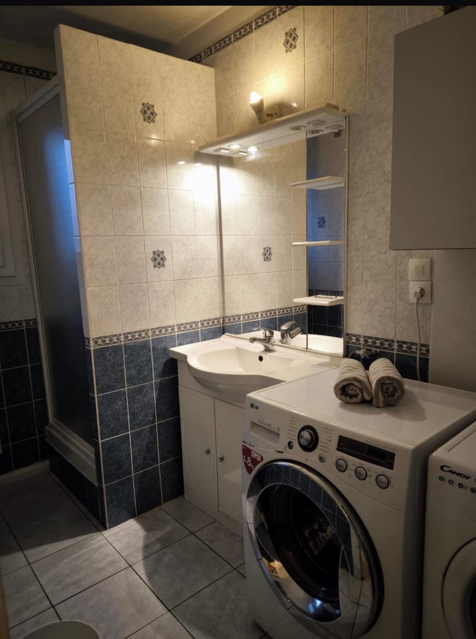 Shower, Bathroom, towels, washing machine, dryer