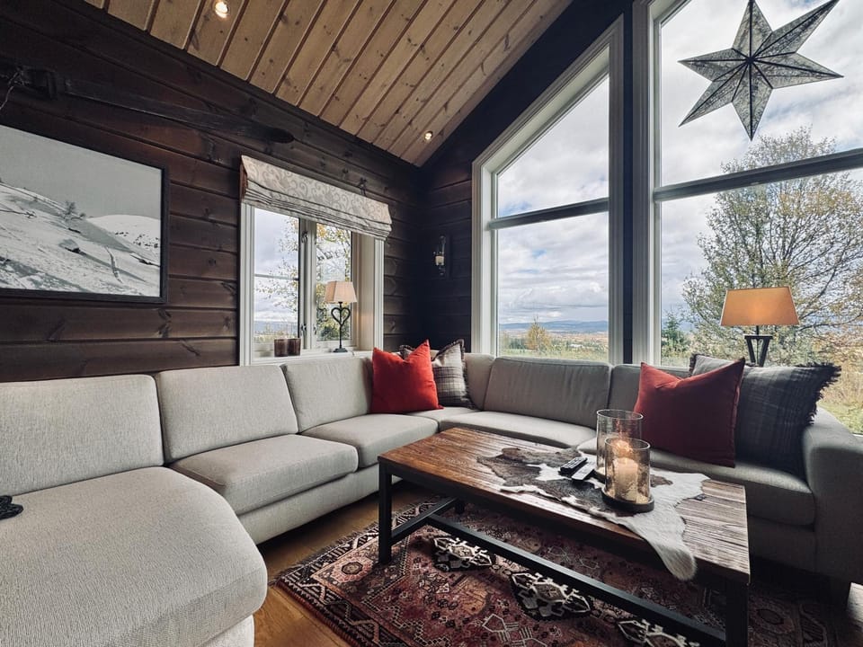 Natural landscape, Living room, Seating area, Mountain view, fireplace