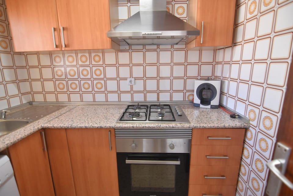 Kitchen or kitchenette, stove