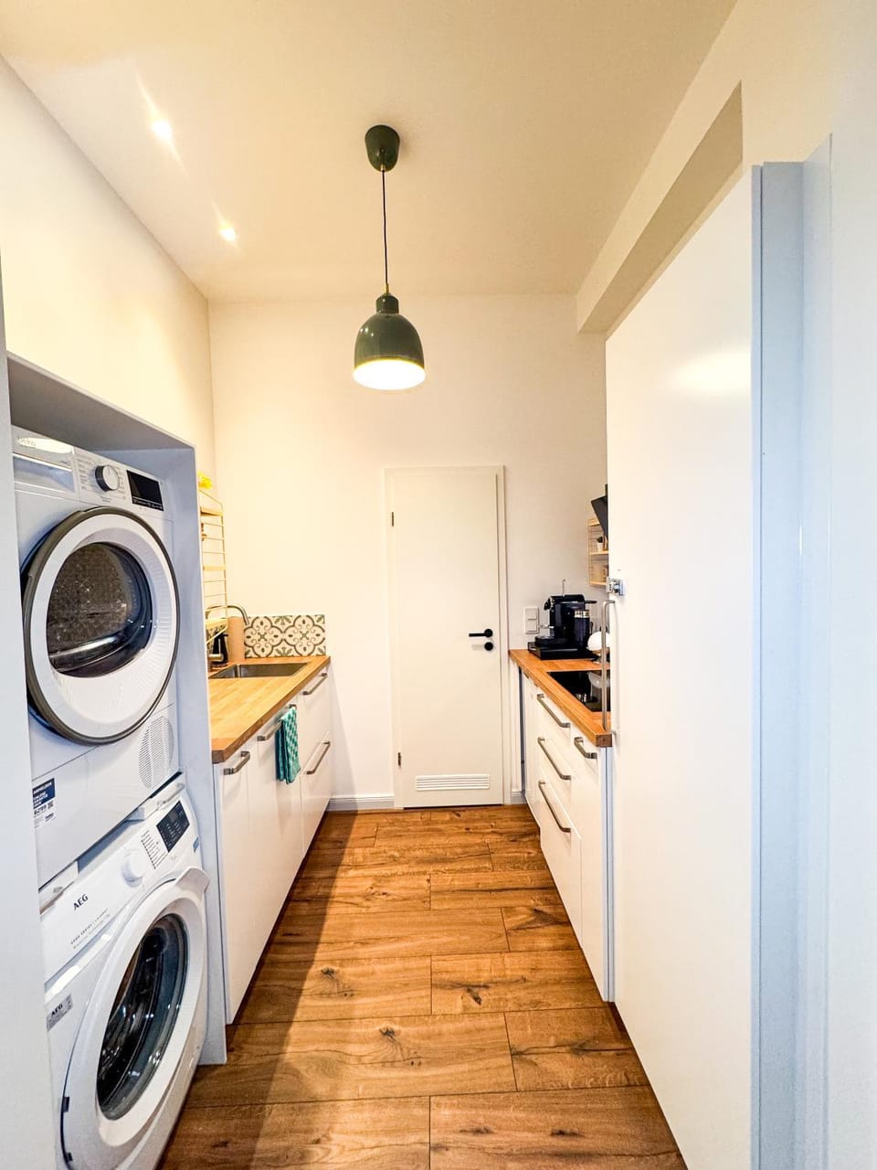 Kitchen or kitchenette, dishwasher, stove, washing machine, dryer