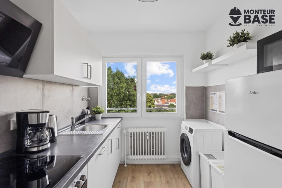 Kitchen or kitchenette, dishwasher, oven, stove, washing machine, dryer