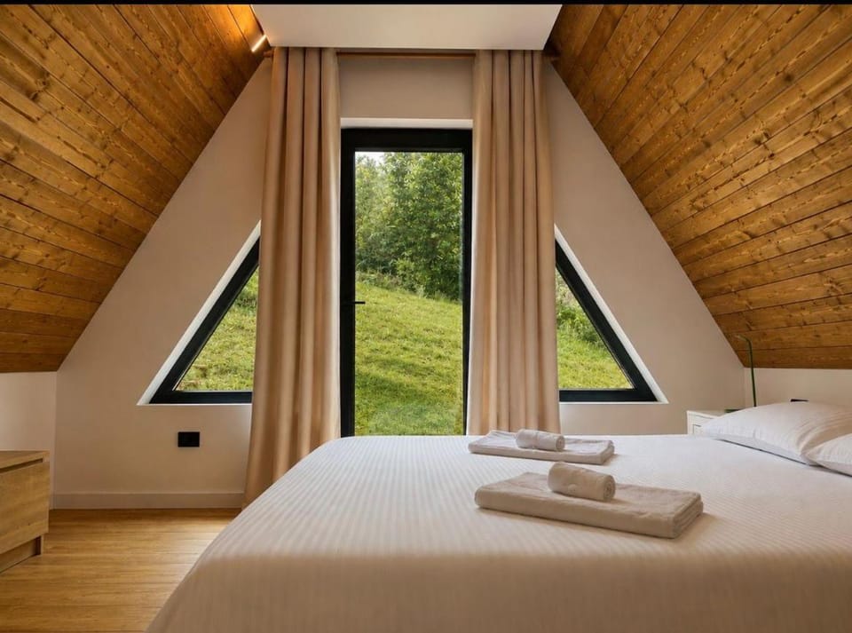 Riverside A-frame House in Romania