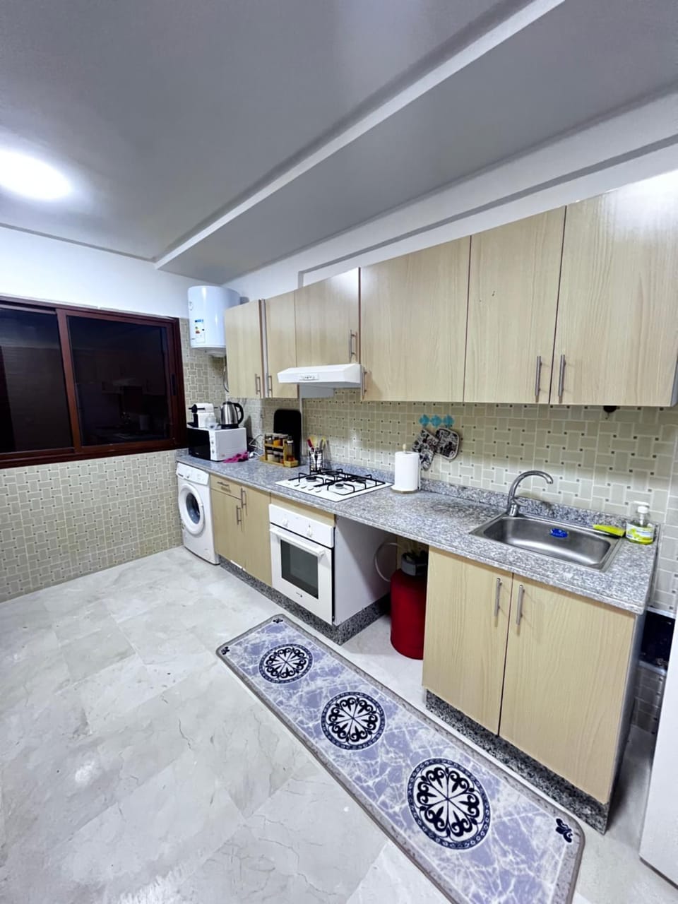 Kitchen or kitchenette, oven