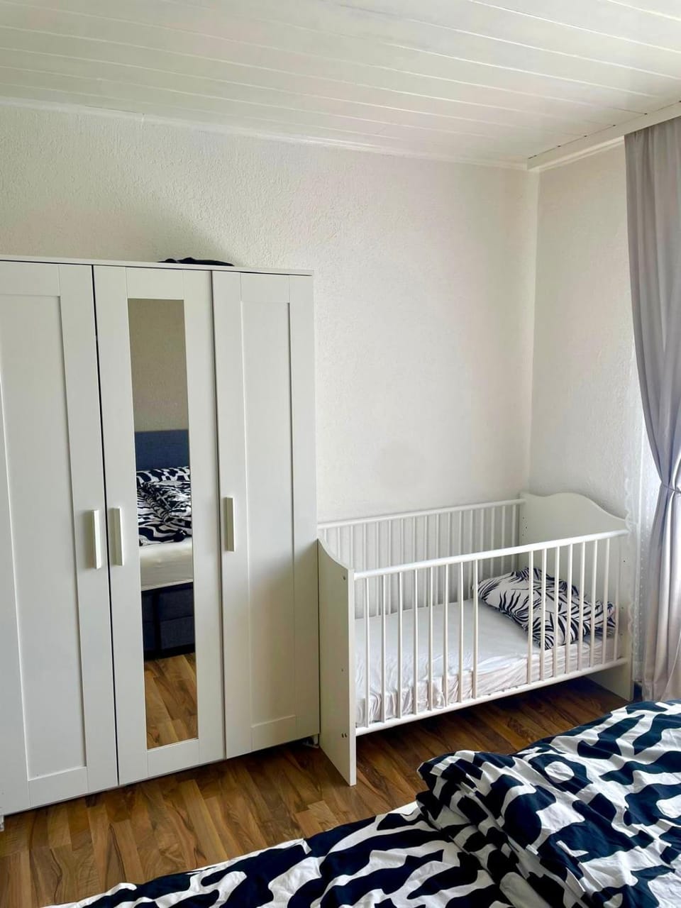 Bedroom, cot, wardrobe