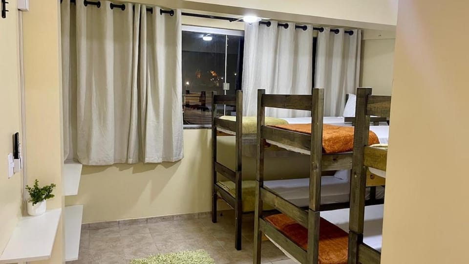 Bedroom 1 For groups and companies Apartment in State of Goiás
