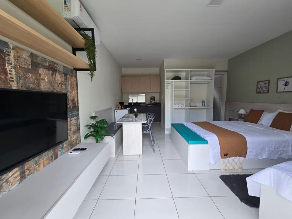 Bed, TV and multimedia, Kitchen or kitchenette, Living room, Photo of the whole room, Bedroom, towels